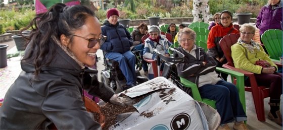 Garden volunteer doing a demonstration 