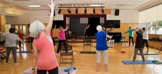 Adults participating in fitness class