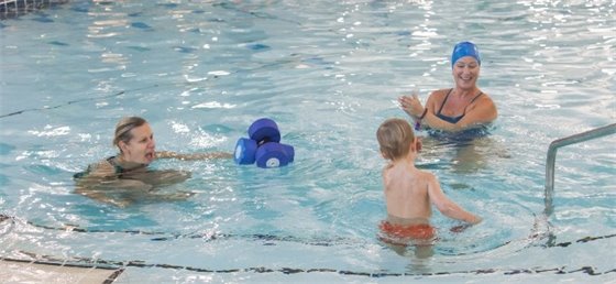 Child in swimming lesson