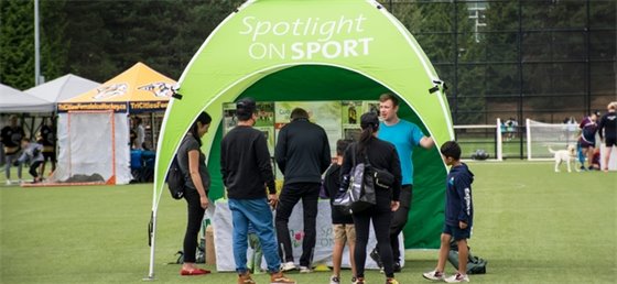 Volunteer at the Spotlight on Sport tent 