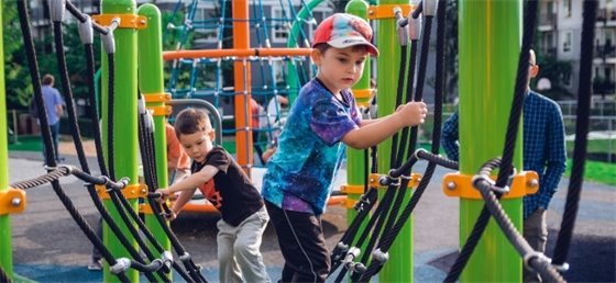 Two kids playing on playground