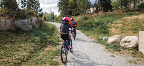 Kids biking on a trail