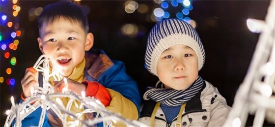 Two children enjoying the lights
