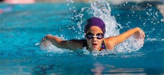Children swimming in breast stroke 