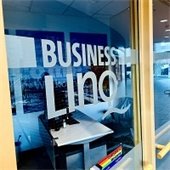 Window at Coquitlam City Hall emblazoned with "Business LINQ"