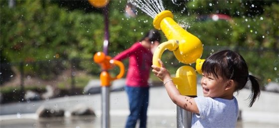 Young child at a spray park