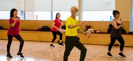 Adults participating in a fitness class