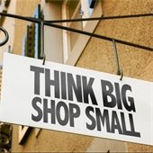 Sign reading "Think Big, Shop Small"