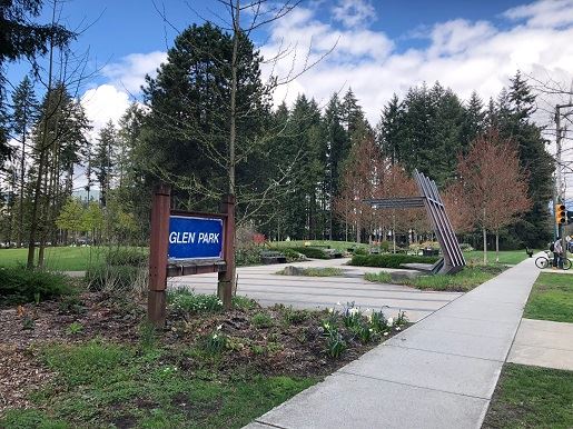 Blue sign at park reading 