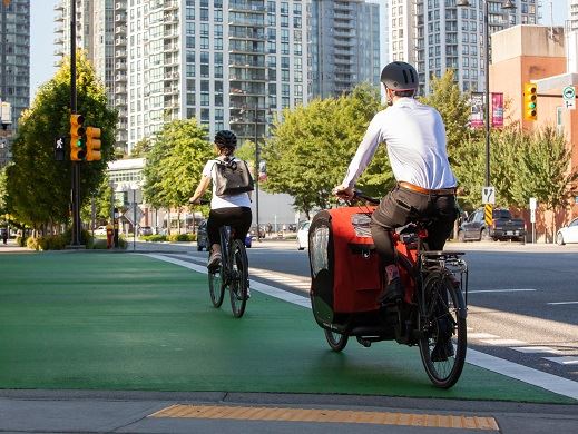 Cyclists riding through City Centre Multi Modal Path and Intersection