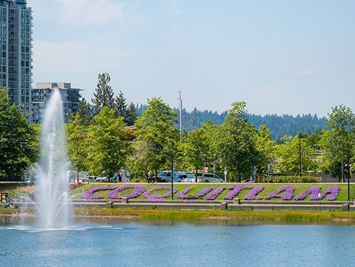 An image of purple flowers spelling out Coquitlam at Town Centre Park.