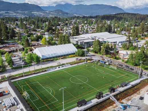 Aerial shot of Centennial Field with Poirier Sport and Leisure Complex behind it