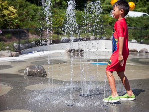 Boy in spray park