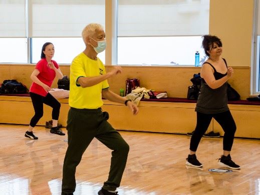 Adults participating in a fitness class