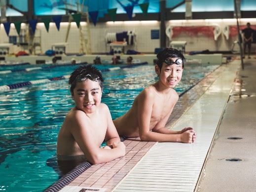 Two youth swimming