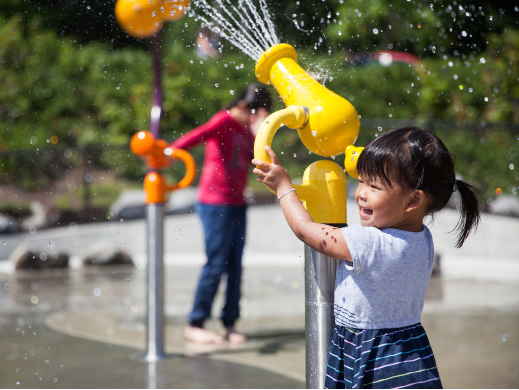 Child at spray pad