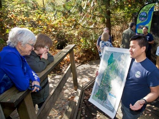 Volunteer holding map