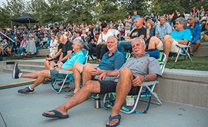 Crowd Gathered in Outdoor Amphitheater