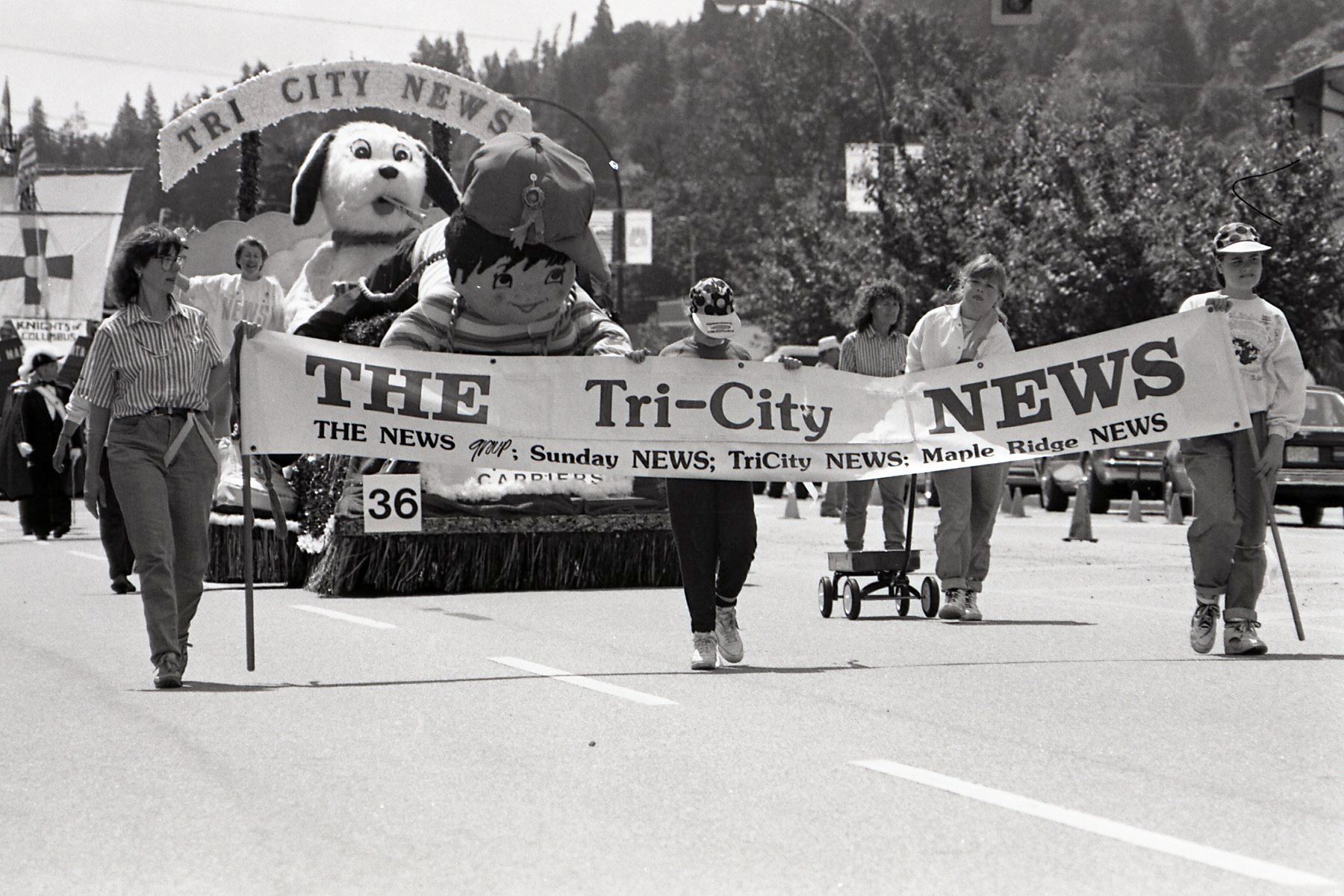 Tri-City News banner and float in the Coquitlam Centennial Parade, 1991