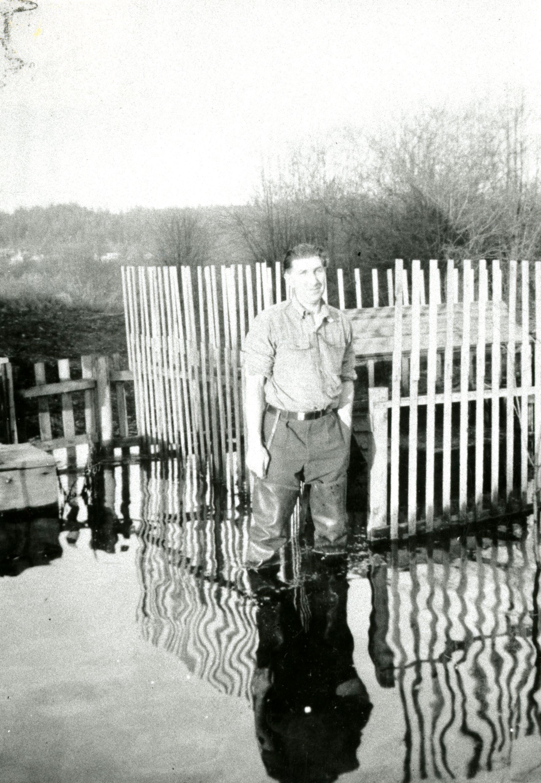 Harold Shiefke in his flooded garden, 1948 (Source City of Coquitlam Archives, C6.110) Opens in new window